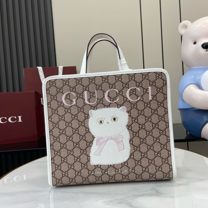 G*u*i shopping bags